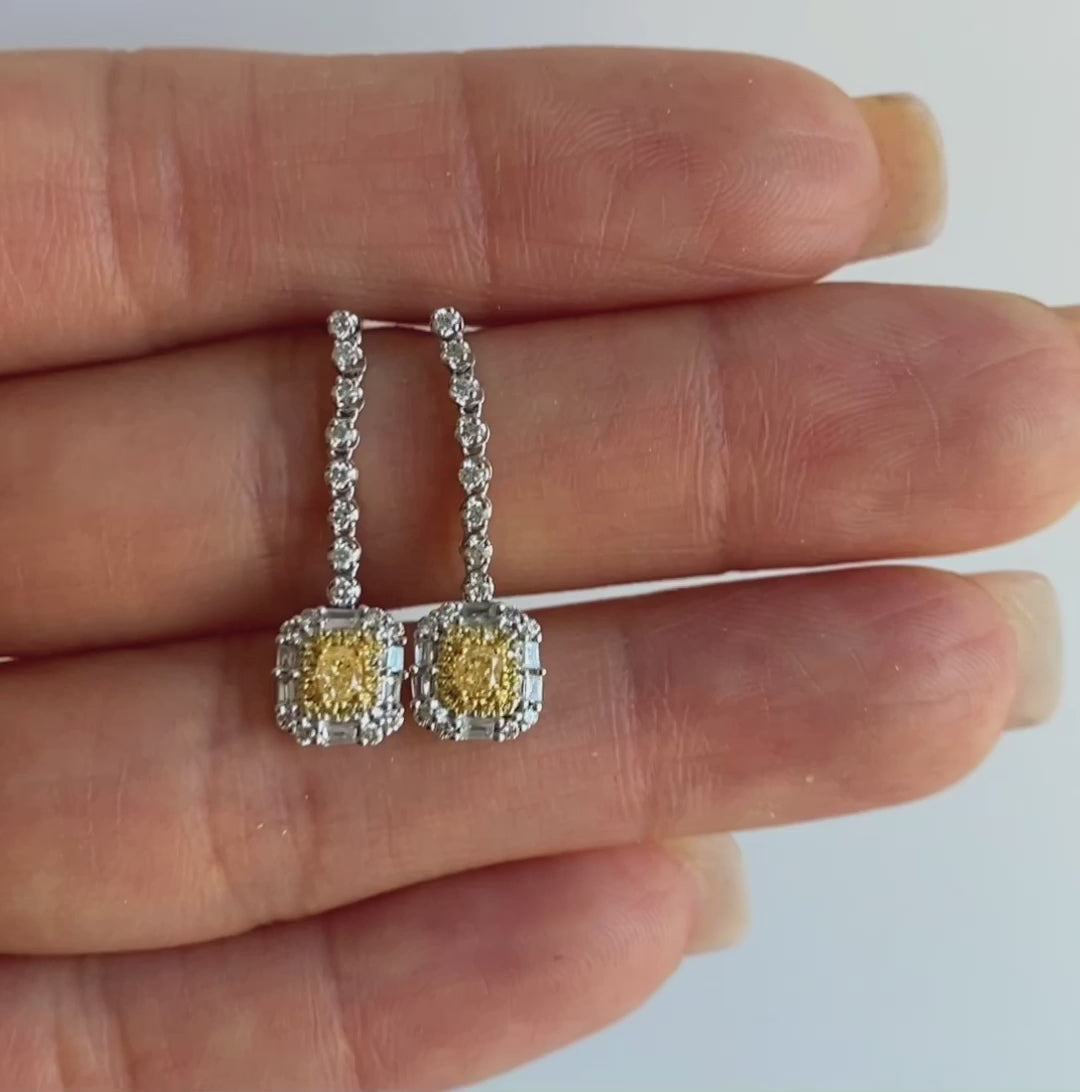 yellow diamond emerald shape earrings in 18k white gold video