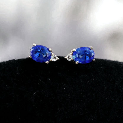 single tulip sapphire diamond earrings 18k white gold