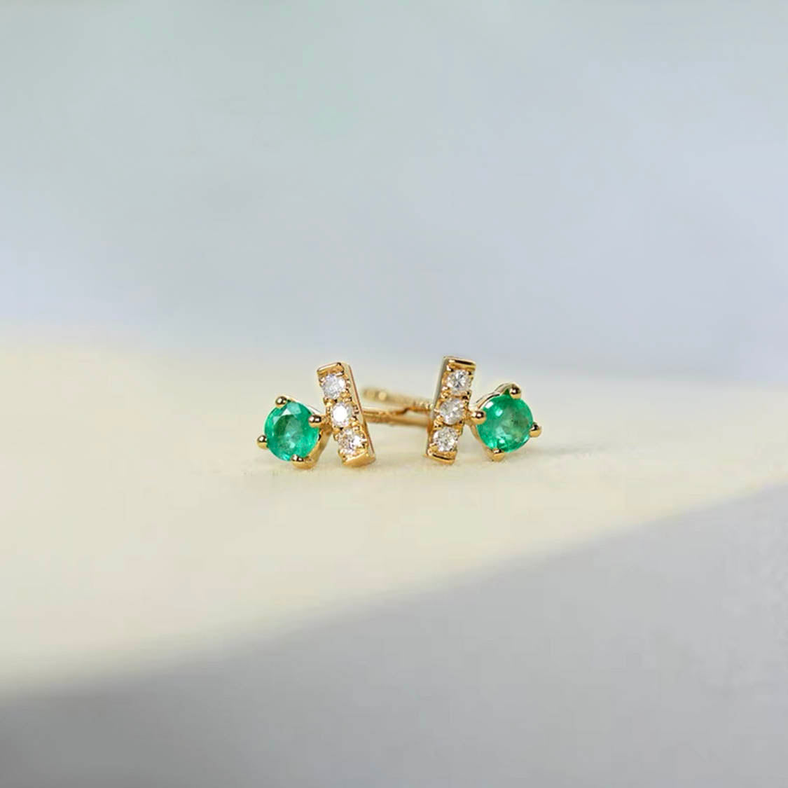 t for tulip emerald and diamond earrings in 18k gold