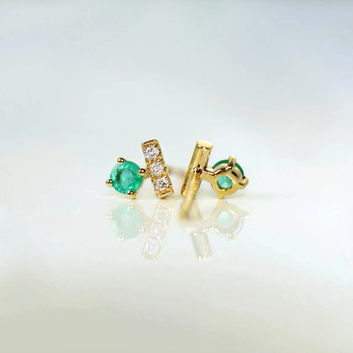 t for tulip emerald and diamond earrings in 18k gold