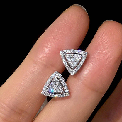 triangle cluster diamond earrings in 18k white gold on hand