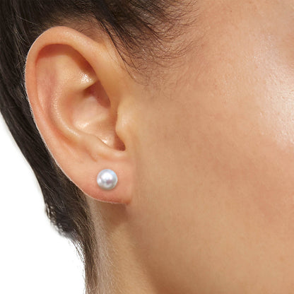 underwater 8mm akoya cultured pear earring in 18k white gold on ear