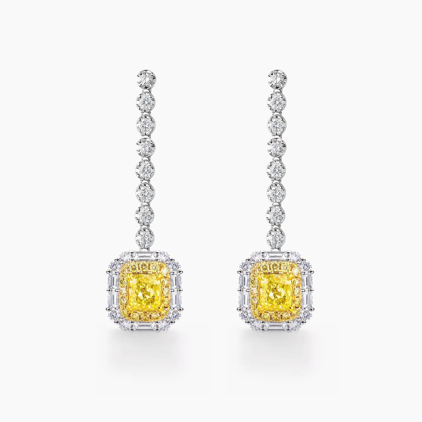 yellow diamond emerald shape earrings in 18k white gold