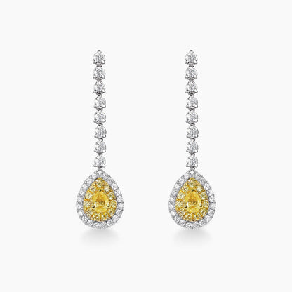 yellow diamond pear earrings in 18k white gold