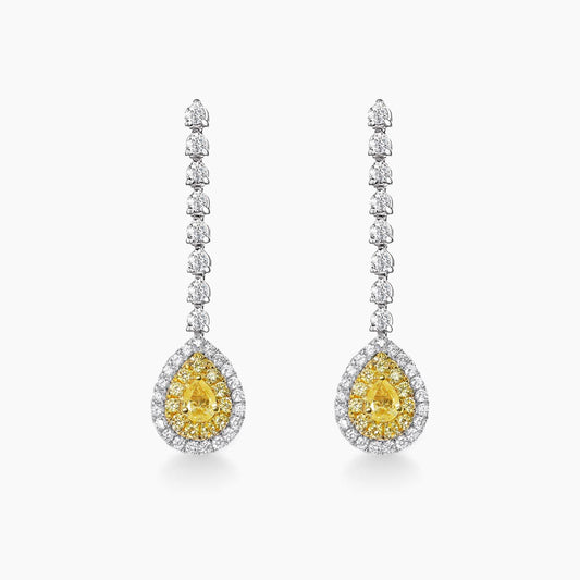 yellow diamond pear earrings in 18k white gold