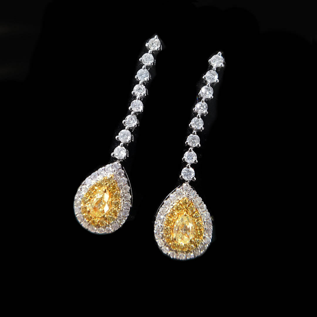 yellow diamond pear earrings in 18k white gold zoom