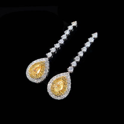 yellow diamond pear earrings in 18k white gold zoom