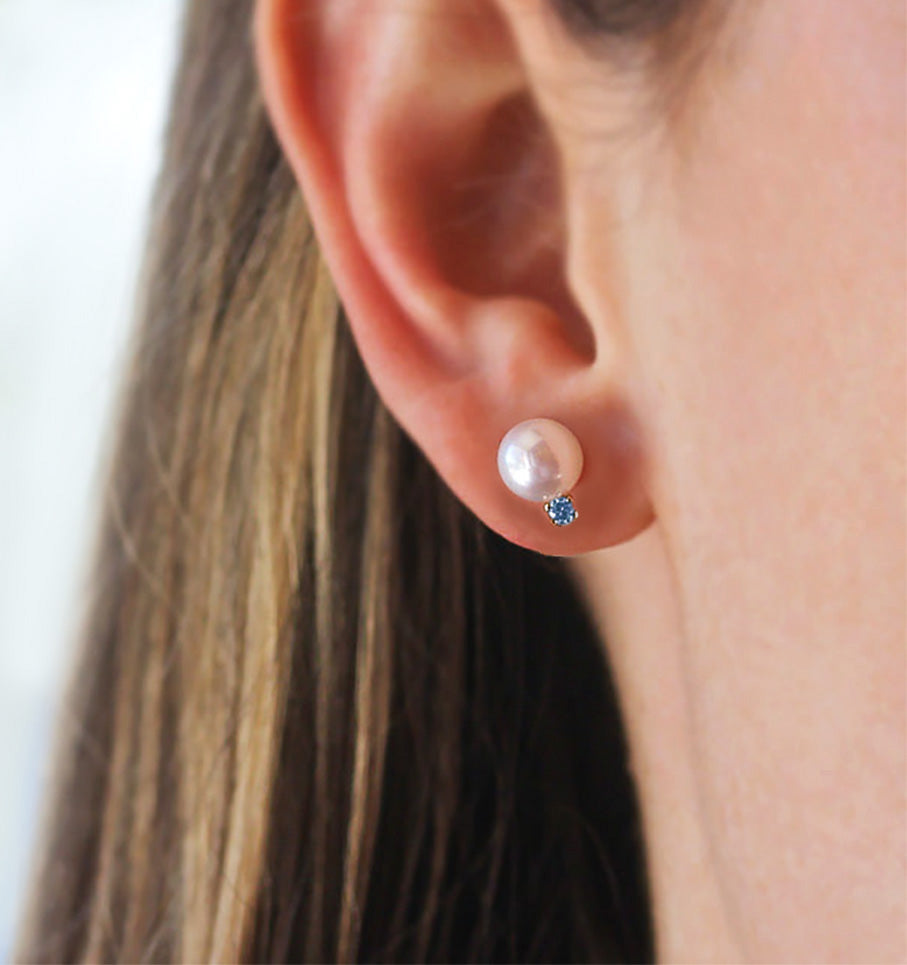 akoya pearl blue sapphire earrings 18k gold on ear