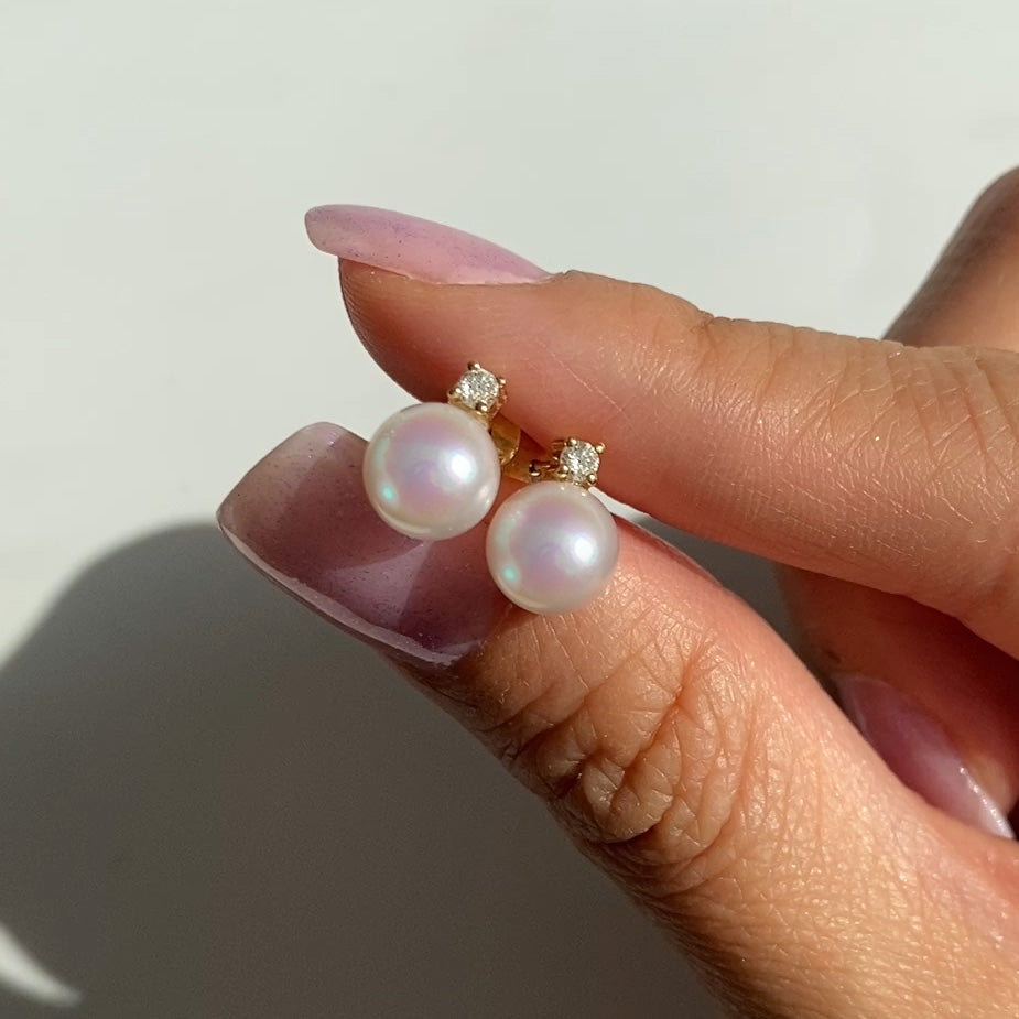 akoya pearl diamond earrings 18k gold on hand