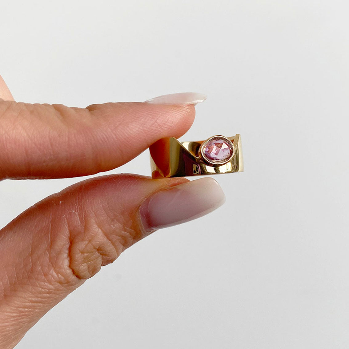 crepe pink sapphire cigar ring 18k gold