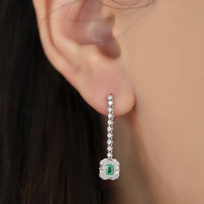 emerald diamond earrings 18k white gold on ear