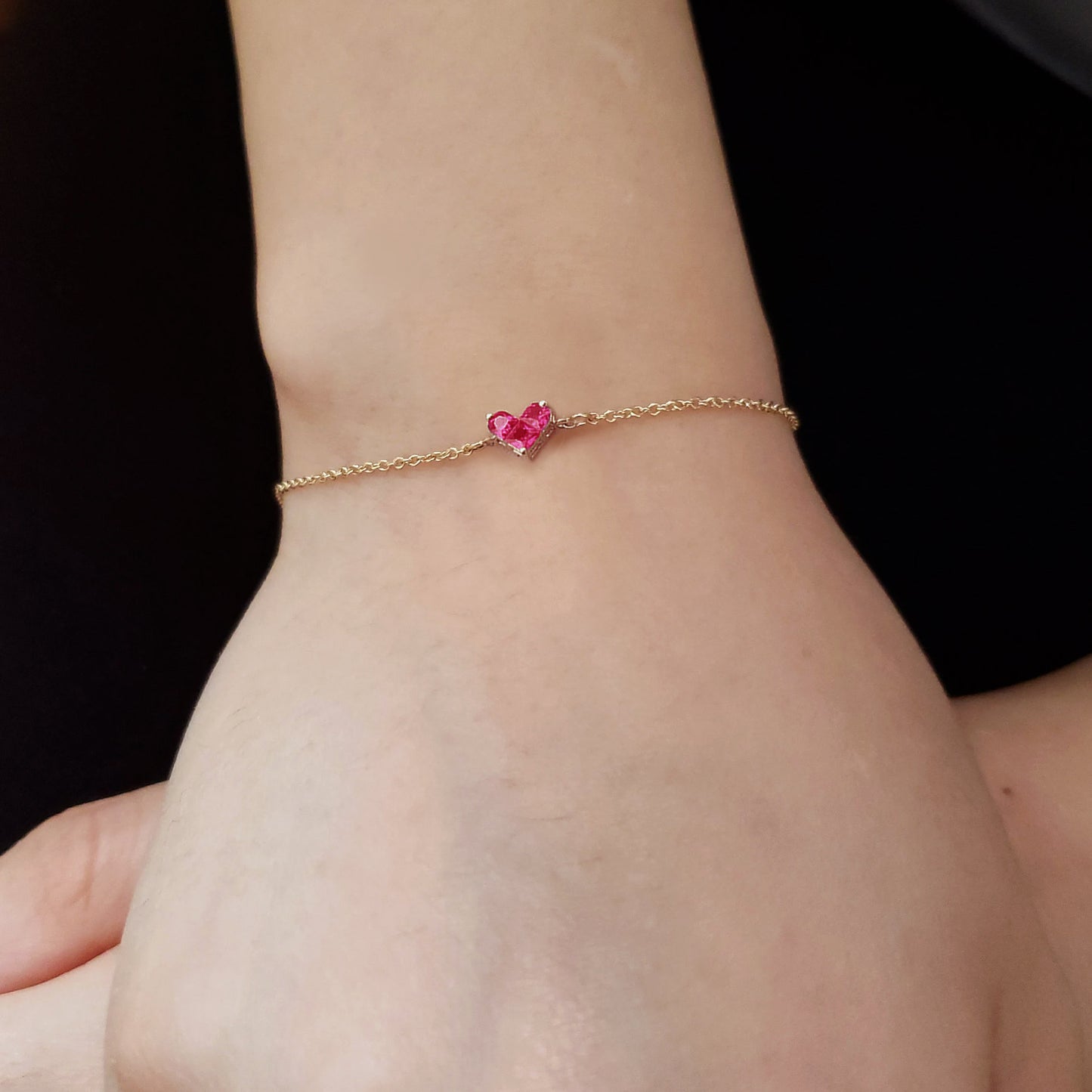 0.27ct ruby by heart bracelet 18k gold on hand