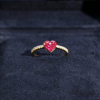 0.5ct ruby by heart diamond ring 18k gold on table