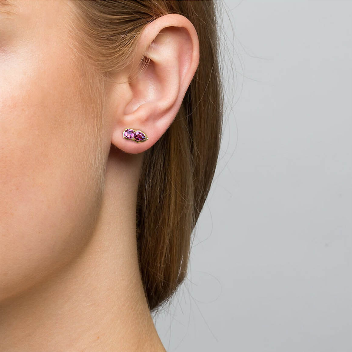 pink spinel earrings 18k gold on ear