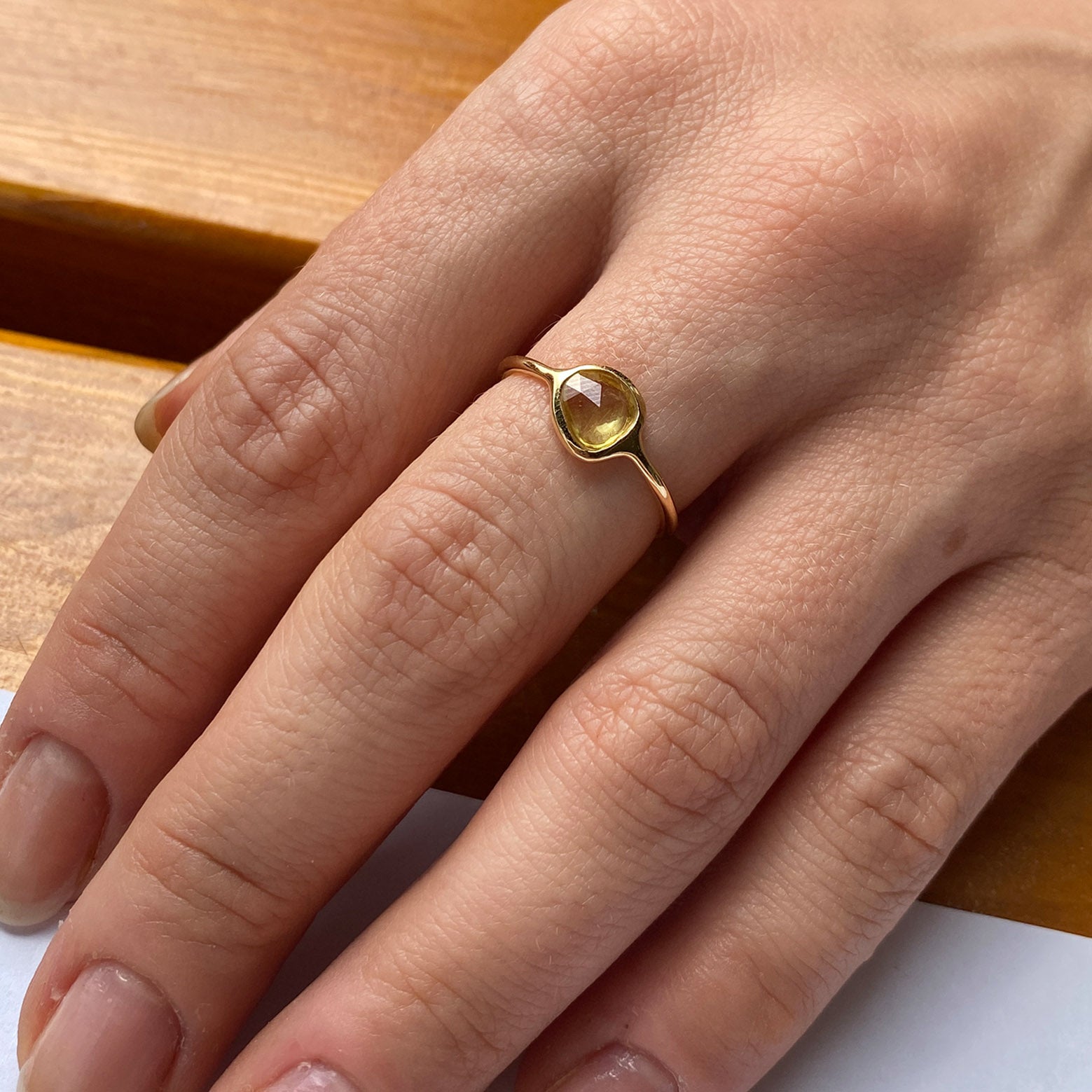 lemon yellow sapphire ring 18k gold on finger